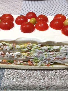 Una foto de Pastel de salmón y surimi