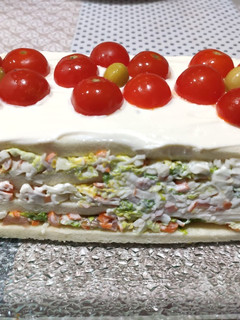Una foto de Pastel de salmón y surimi