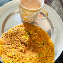 A picture of Besan Chilla With Tea 🫖☕️.