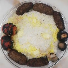 A picture of Chullo kbab with rice.