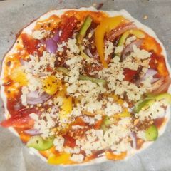 Parmesano vegetable pizza A picture of Parmesano vegetable pizza.