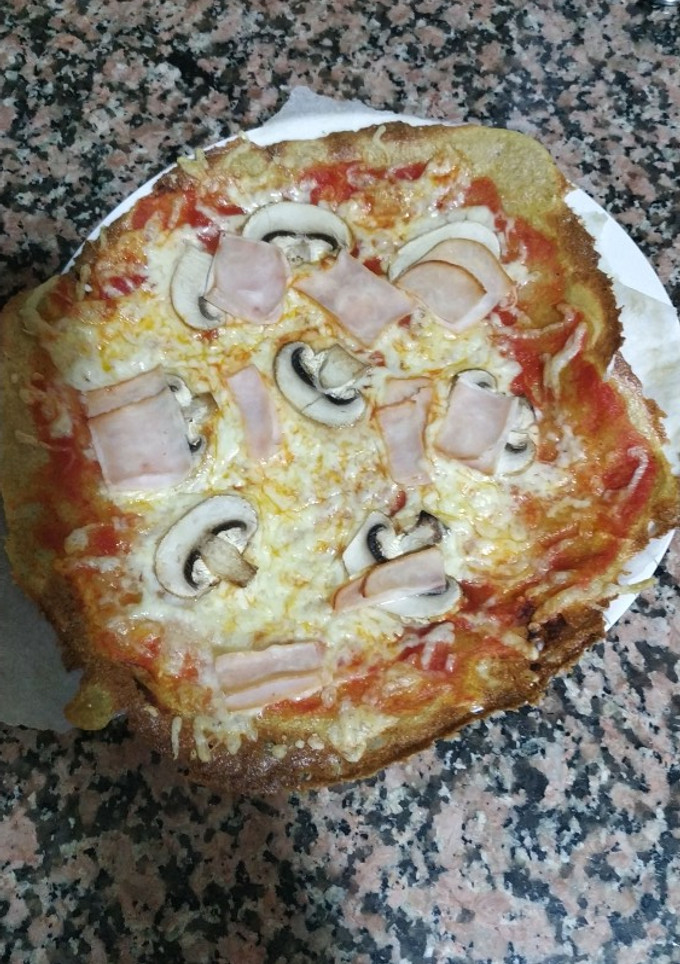 Una foto de Pizza con base de quinoa