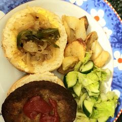 A picture of Mutton, Burger Bun, Fries and Salad.