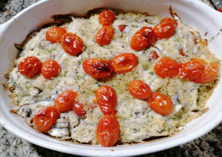 Tortino di acciughe fresche e ciliegini gratinato in forno