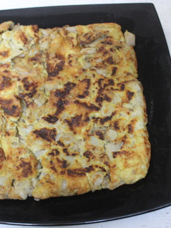 Una foto de Tortilla cuadrada de tupinambas