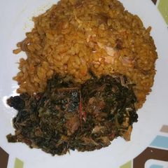 A picture of Ofada Jollof and smoked fish Veg.