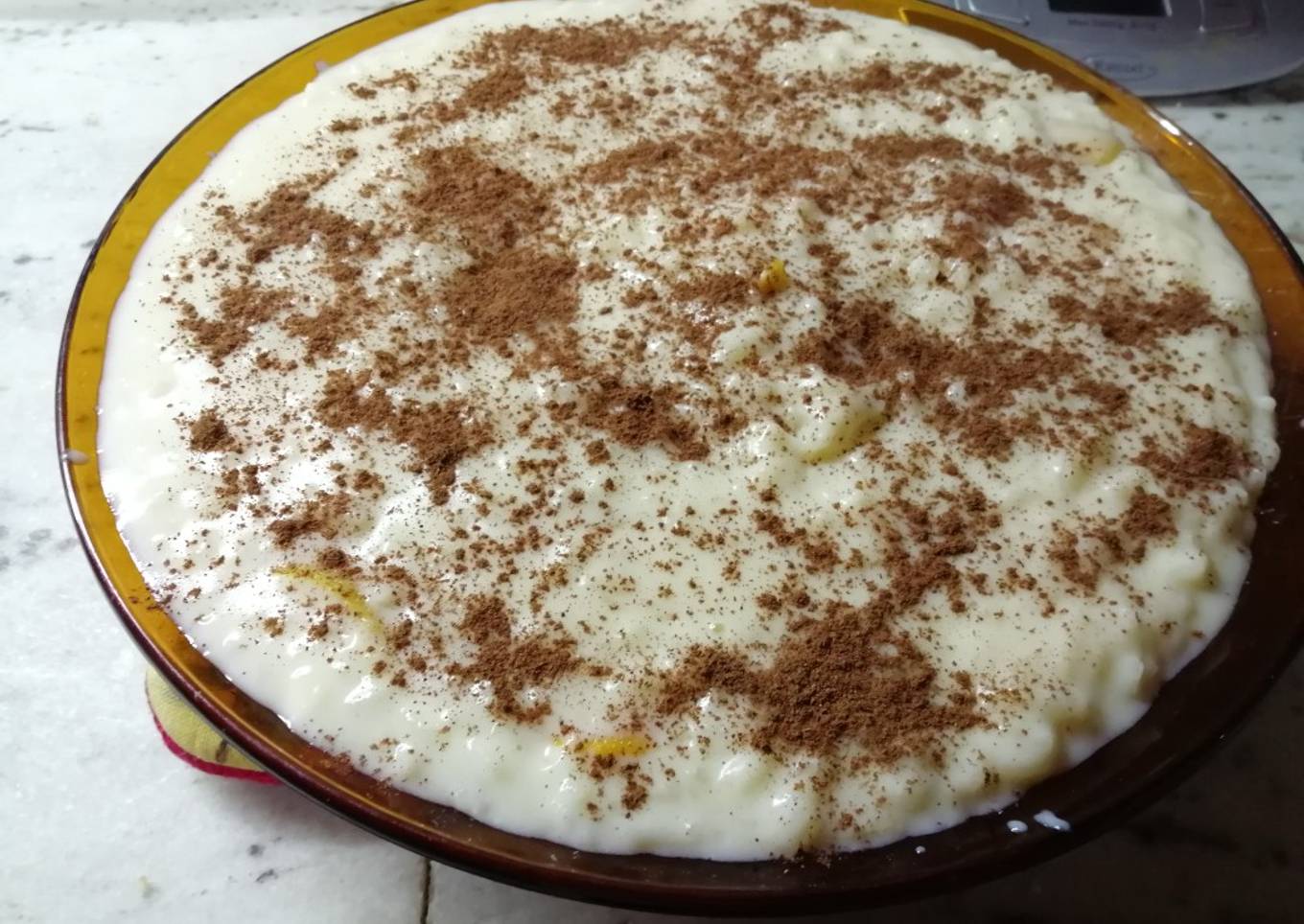 Arroz con leche, canela y naranja