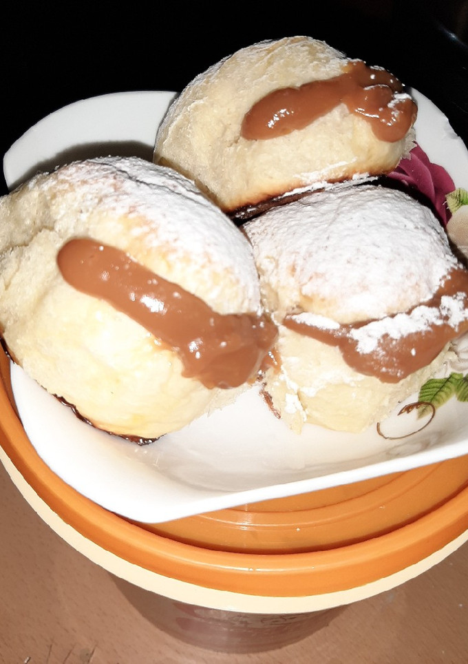 Una foto de Pan de leche con dulce de leche