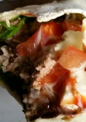 Una foto de Durum de pollo y cerdo