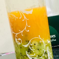 A picture of Refreshing orange kiwi mocktail.