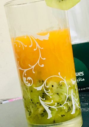 A picture of Refreshing orange kiwi mocktail.