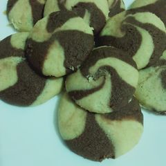 Two tone cookies with chocolate filled inside A picture of Two tone cookies with chocolate filled inside.