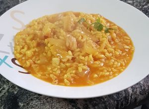 Foto principal de Arroz meloso con bacalao y cebolla