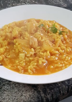 Foto principal de Arroz meloso con bacalao y cebolla
