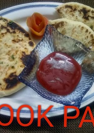 A picture of Tandoori chicken Naan.