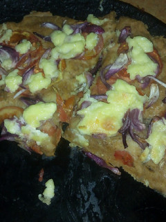 A picture of Wood Oven Pizza With Cream Instead Of Cheese.