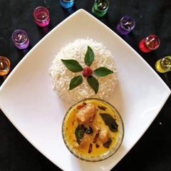 A picture of Curry with boiled rice.