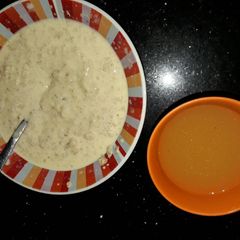 A picture of Quaker oats and nutri c orange juice.