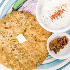 A picture of Potato paranthas with whole wheat & veggie dough.