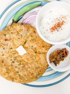 A picture of Potato paranthas with whole wheat & veggie dough.