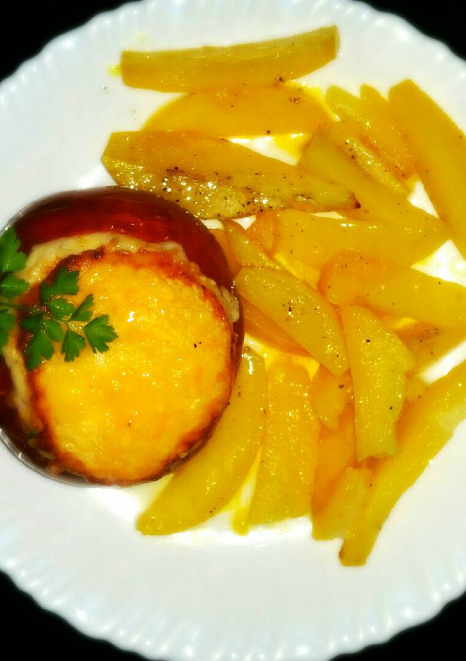 Una foto de Tomates rellenos asados