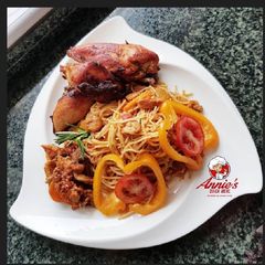 A picture of Sea food pasta, Fried chicken and shrimp/shredded chicken sauce.