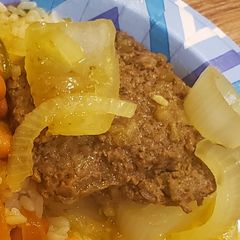 A picture of Bistec encebollado.