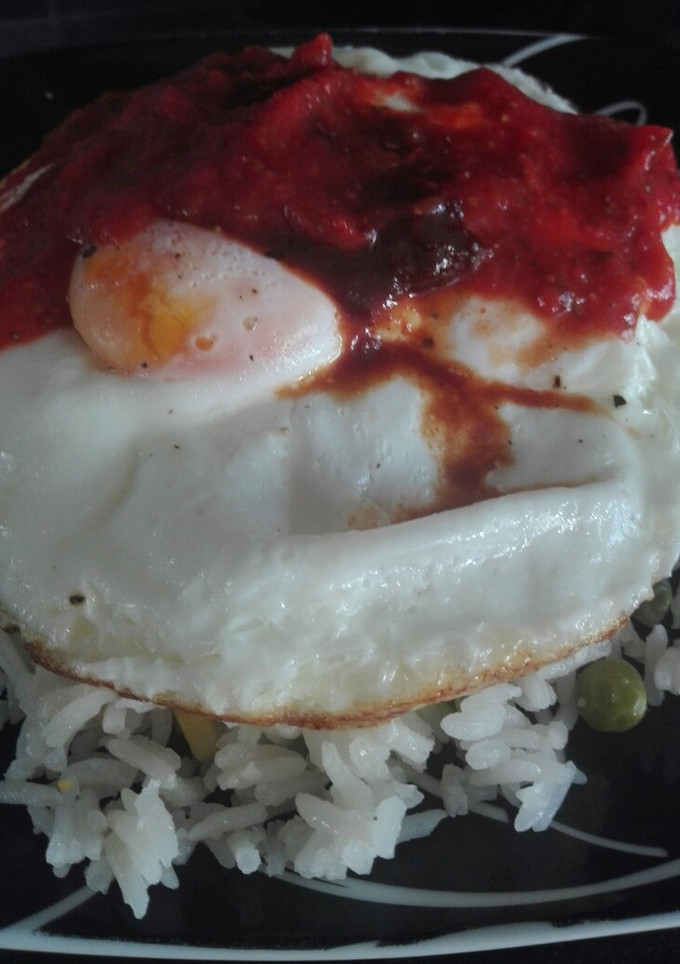 Una foto de Arroz con huevo
