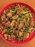 Salt fried pork with garlic stems