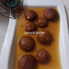 A picture of Caramel Rasogolla.