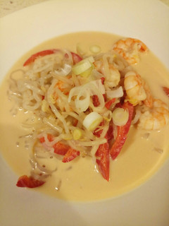 A picture of Thai prawn and noodle soup.