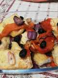 Baccalà con Cipolle di Tropea, Peperoni e Olive Nere