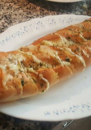 Una foto de Pan de ajos con queso