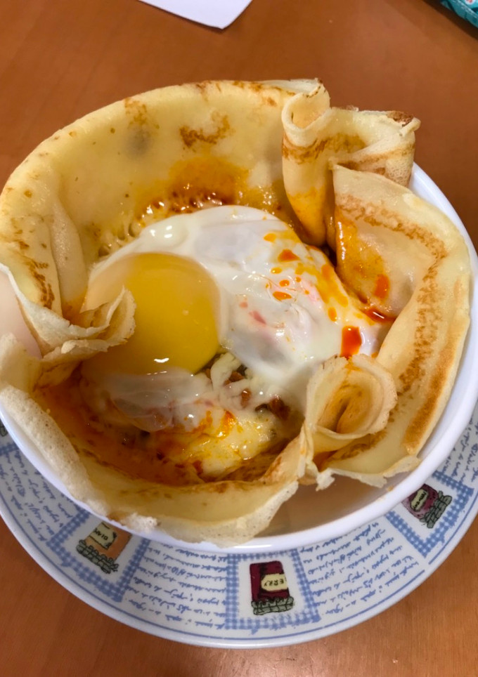 Una foto de Crepes de picadillo, queso y huevo