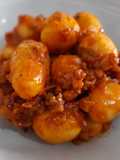 Patatas Paris con sofrito de calamar