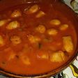 Salchichas de pollo con pisto