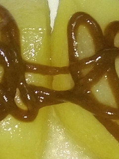Una foto de Salsa de mango y aceite de sésamo