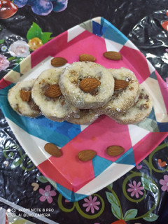 A picture of Badam khoya dry fruit roll.