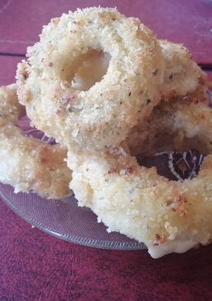 Una foto de Aros de cebolla rellenos con queso