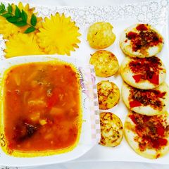 A picture of Appam Uttapam with Pineapple Rasam Platter.