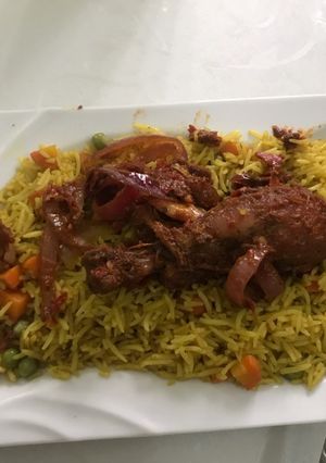 A picture of Special fried rice and chicken pepper.