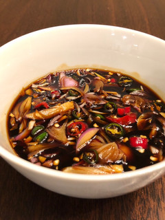 A picture of Indonesian spicy sweet soy dipping sauce (sambal kecap).