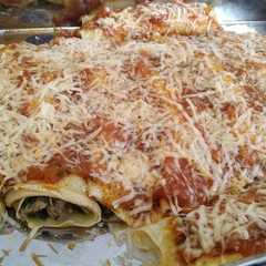 Una foto de Canelones de espinaca o acelga