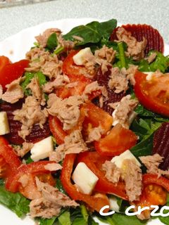 Una foto de Ensalada de espinacas y queso de cabra
