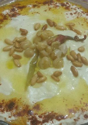صورة لوصفة تسئية ببدوه (فتة حمص بالسمنة)