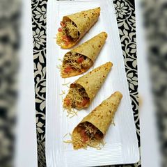 A picture of Chickpeas Salad in Papad Cone.