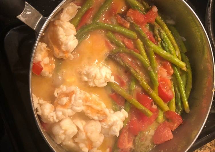 Steps to Make Yummy Sautéed lobster, tomatoes and asparagus with a lemon butter sauce