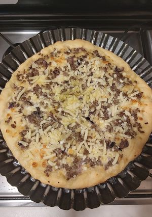 Foto di Pizza con salsiccia e caciocavallo