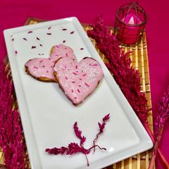 A picture of Frosting sugar cookies.
