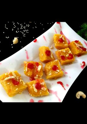 A picture of Orange milk powder barfi.